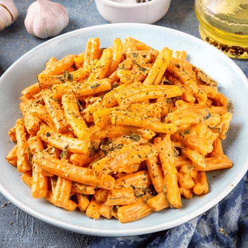 Casarecce pasta with short, loosely rolled and twisted pieces.