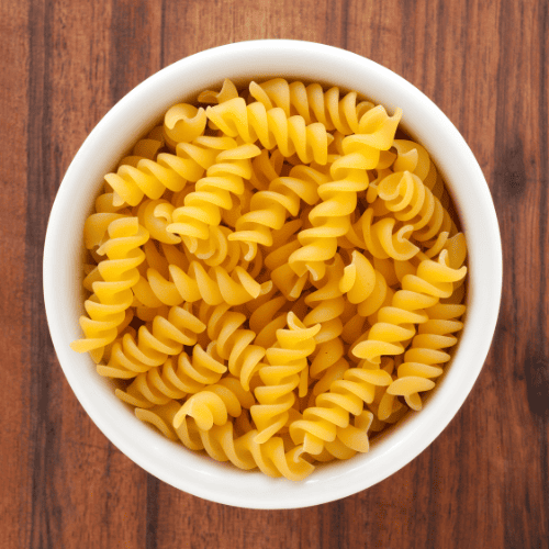 Fusilli pasta with short corkscrew-shaped spirals.
