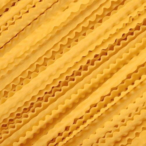 Mafaldine pasta with long ribbons and decorative ruffled edges.