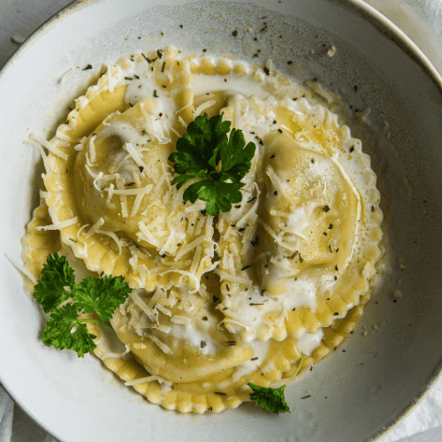 Mezzelune pasta with filled half-moon-shaped parcels.