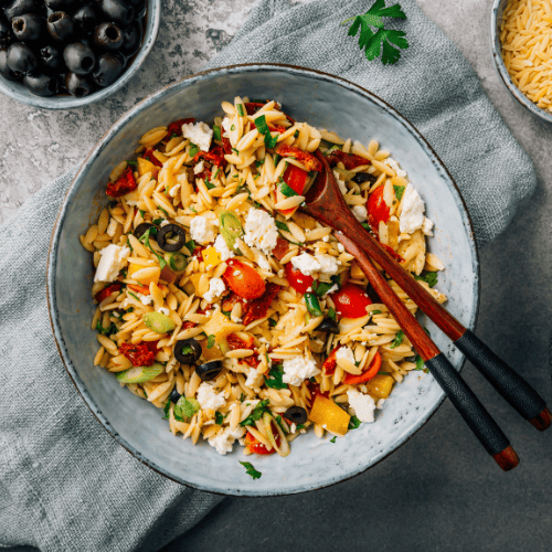 Orzo pasta with small pieces shaped like grains of rice.