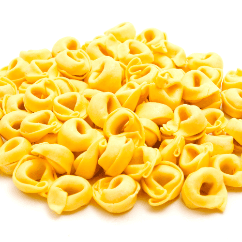 Tortellini pasta with small, ring-shaped filled pieces.