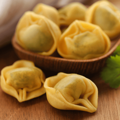 Tortelloni pasta with large ring-shaped parcels filled with cheese or vegetables.