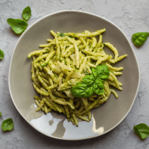 Trofie pasta with short, narrow, hand-twisted shapes.